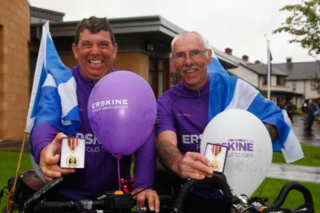 Martin Burnett from Tranent cycles into the Erskine centre in Gilmerton to finish the ride from Rome to Edinburgh. Pic credit: Scott Louden.