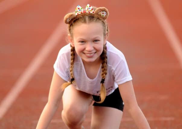 Amy McLaughlan ran to raise funds for Children in Need. Picture: Alan Wilson