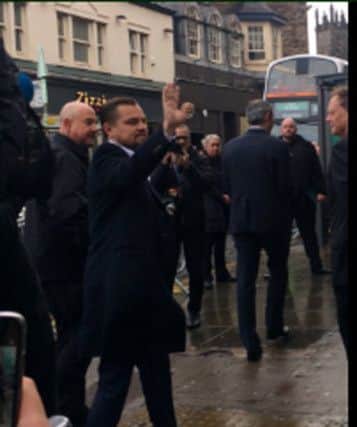 Leonardo diCaprio waving to the people of Edinburgh outside 'Home' on Queensferry Street