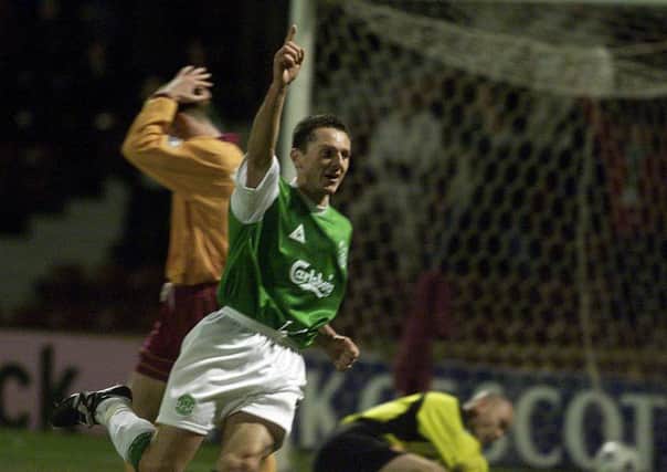 David Zitelli scored twice and is pictured celebrating putting Hibs ahead at Fir Park