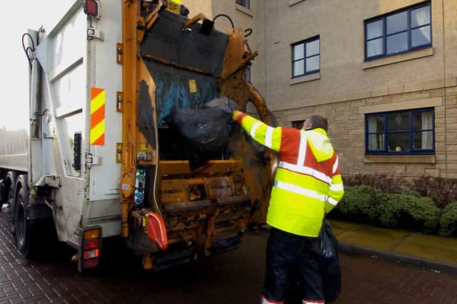 Rubbish bins being emptied in Edinburgh. Picture: TSPL
