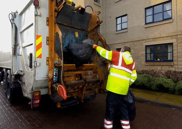 Rubbish bins being emptied in Edinburgh. Picture: TSPL