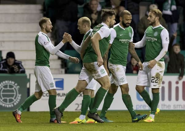 Darren McGregor, centre, is one of a host of Hibs players out of contract in the summer. Pic: SNS