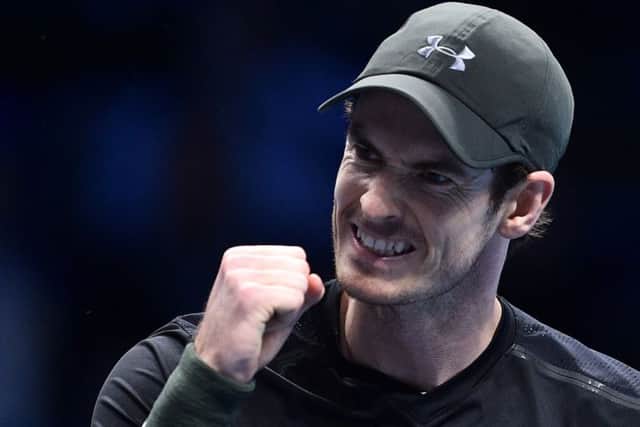 Andy Murray celebrates winning a game during the match against Novak Djokovic. Picture: AFP/Glyn Kirk