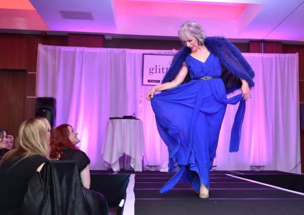 Models strut their stuff at a Glitteratea fundraiser in aid of the Evening News 'Buy a Brick' appeal for Maggie's Centres.