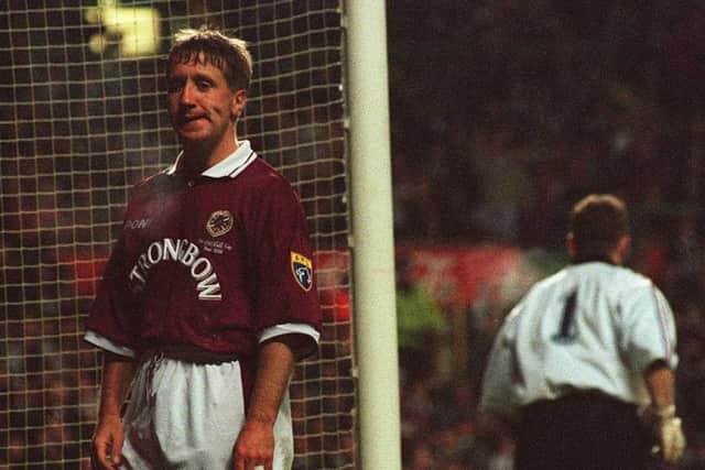 Hearts striker John  Robertson, who scored to make it 2-2, cuts a picture of dejection on the final whistle after Paul Gascoigne had scored two sublime goals following Robbos equaliser