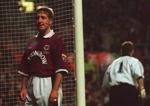 Hearts striker John  Robertson, who scored to make it 2-2, cuts a picture of dejection on the final whistle after Paul Gascoigne had scored two sublime goals following Robbos equaliser