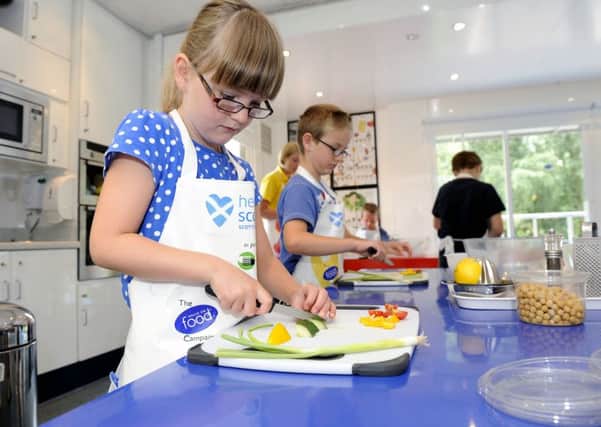 The average 11-year-old should be able to cook at least 25 dishes from stew to sponge cake making them more independent. Picture: Michael Gillen