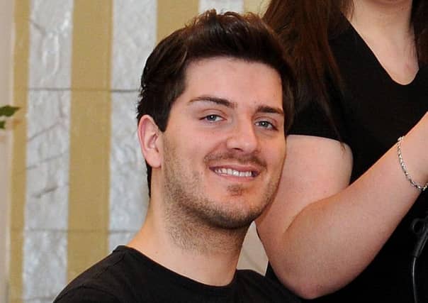 Daryll Rowe in his role as stylist at Myles Hairdressing on Dalry Road. Pic Lisa Ferguson.
