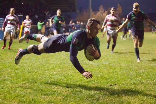 Jordan Edmunds flies over the whitewash for Boroughmuir in the second half. Pic: Toby Williams