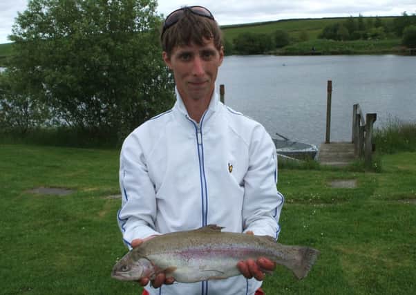 Colin Brash of Mayfield with 4lb rainbow taken on a Damsel at Rosslynlee Fishery