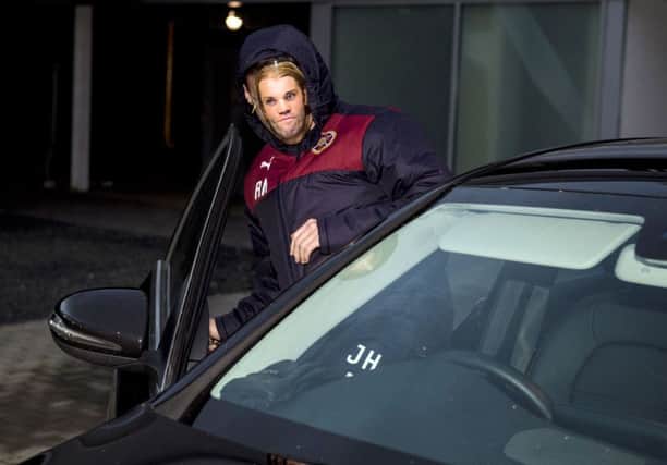 A Robbie Neilson lookalike leaves Hearts' training complex earlier today. Pic: SNS