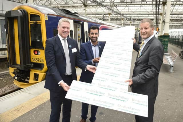 ScotRail parent firm Abellio UK managing director Dominic Booth celebrates the line's first birthday in September with transport minister Humza Yousaf and ScotRail managing director Phil Verster. Picture: Greg Macvean