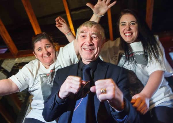 Maureen Taylor and Siobhan Dodds, staff at Diane's Pool Hall, Edinburgh pose with Ken Buchanan. Picture: Toby Williams