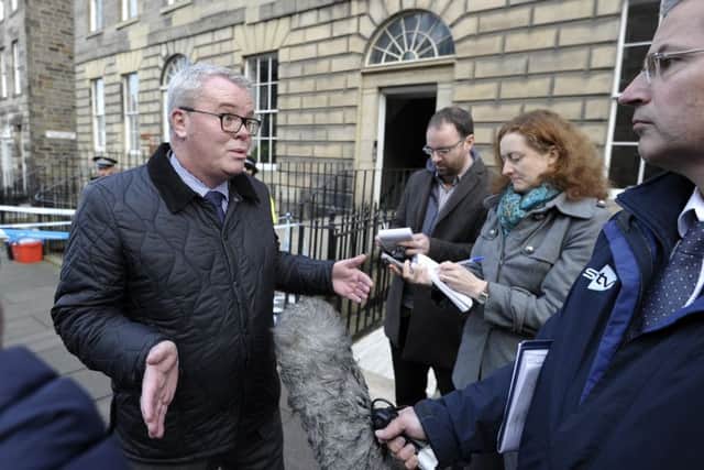 DCI  Keith Hardie held a press conference outside the crime scene.