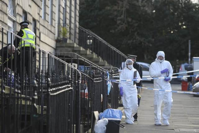 Suspicious death in Scotland Street, Forensic officers leave the scene.. Picture Neil Hanna