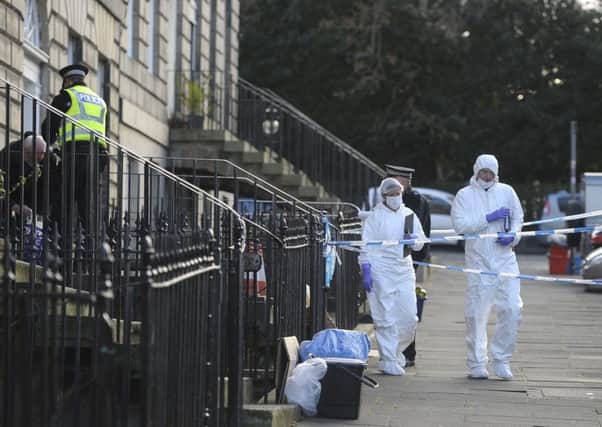 Suspicious death in Scotland Street, 
Forensic officers leave the scene.. Picture
 Neil Hanna