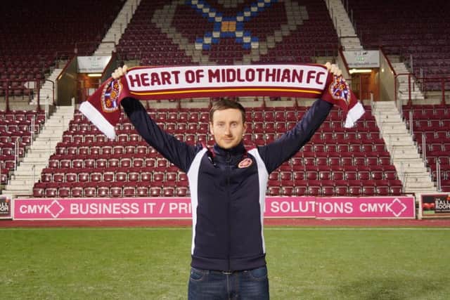Ian Cathro poses after his appointment at Tynecastle