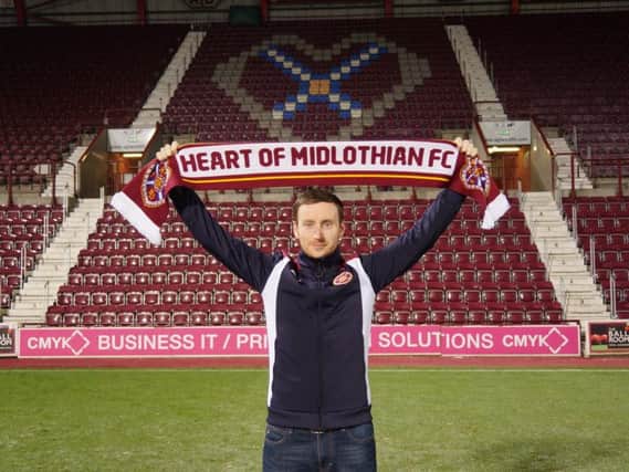 Ian Cathro poses after his appointment at Tynecastle