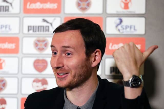 Ian Cathro was in a good mood at the press conference