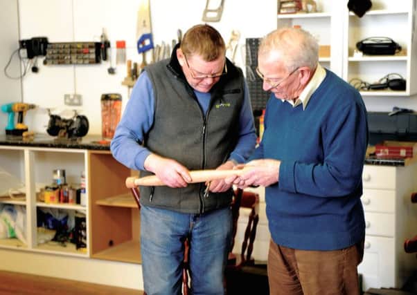 Men's Sheds offer a chance to learn new skills, such as woodwork.