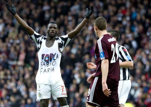 Esmael Goncalves celebrates after playing a big role in helping St Mirren defeat Hearts in the 2013 League Cup final