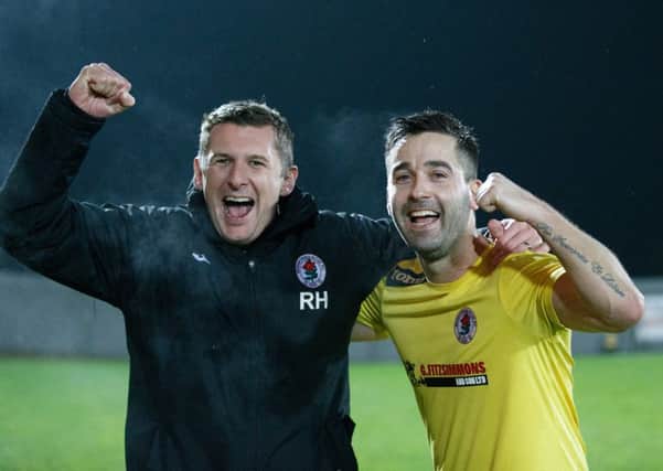 Adam Nelson, right, celebrates Bonnyrigg's historic victory with manager Robbie Horn. Pic: Robert Perry