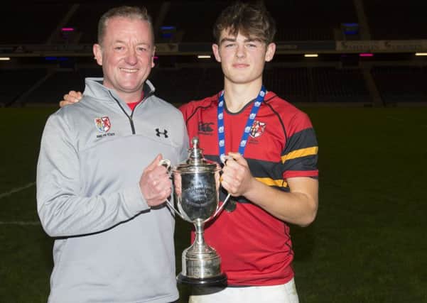 Stewart Melville's coach Bryn Lockie with captain Ross Thompson