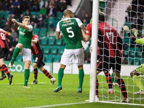 Hibs defenderf Paul Hanlon puts the Easter Road side one up on the stroke of half-time at Easter Road