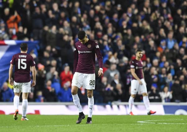 Ian Cathro tried to motivate his players but the heads began to drop after Rangers scored their second goal not long into the second half