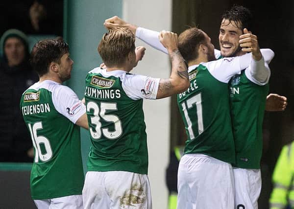 Hibs celebrate Brian Graham's victory-clinching goal. Pic: SNS