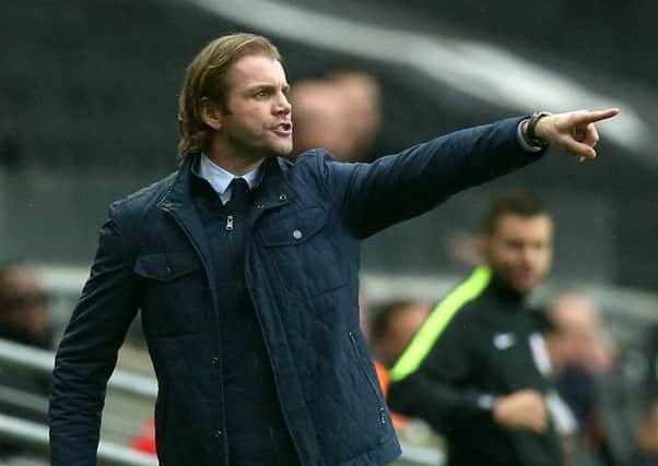 Robbie Neilson guided MK Dons to a home win over Wimbledon. Pic: Getty
