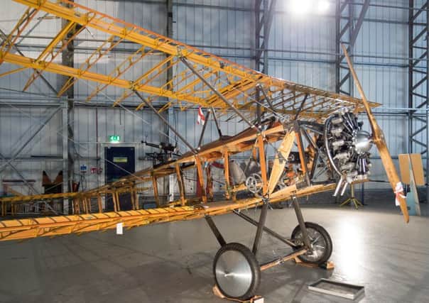 Aviation Preservation Society of Scotland.

Members working on restoring a Sopwith 1 1/2 Stutter WWI bi-plane.