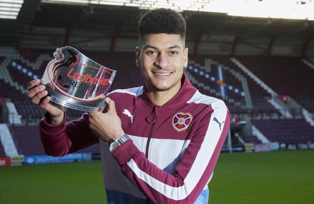 Bjorn Johnsen shows off his player of the month award for November. Pic: SNS