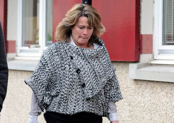 Michelle Thomson leaves her surgery at Muirhouse Millennium. Picture; Lisa Ferguson