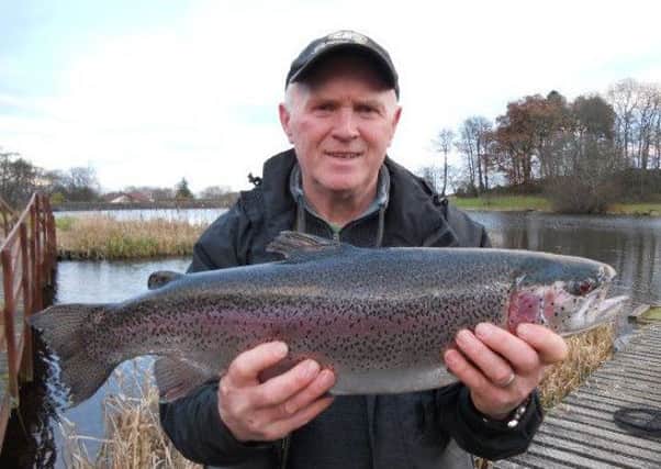 Alan Armstrong from Dollar with a 6lb 12oz rainbow  taken on a Hare's Ear at Swanswater, Stirling