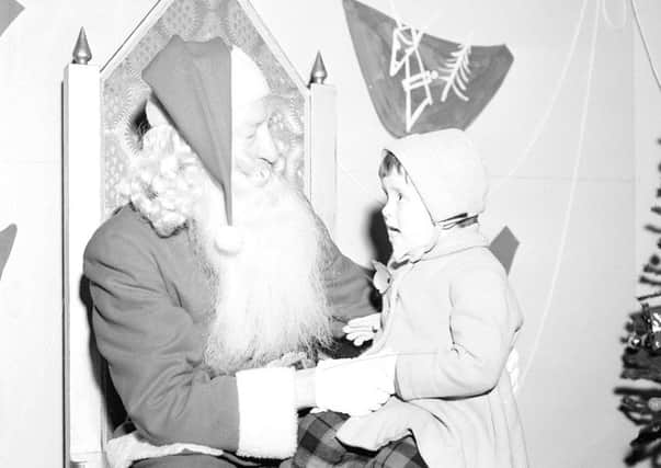 Santa Claus  pictured here in the Patrick Thomsons store in 1958  came through for Christine Grahame when he delivered a doll wearing sandals, a yellow dress and a straw hat