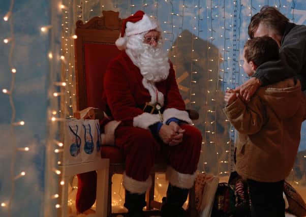 Meeting Santa at his grotto is long-standing Christmas tradition across the world, but did it all start in Edinburgh? Picture: TSPL