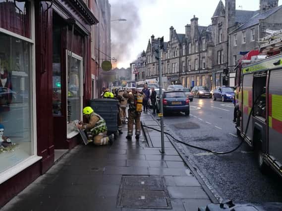 Smoke billowing out of restaurant Livingston's in Linlithgow as fire fighters attend the scene. Picture: Contributed.