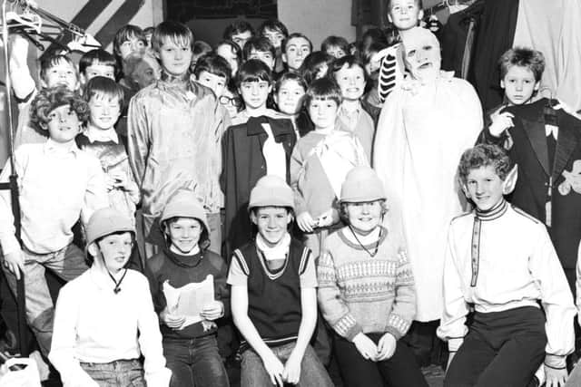 Scouts and cubs backstage at the King's theatre in Edinburgh for a Gang Show costume fitting in November 1984. Picture: TSPL