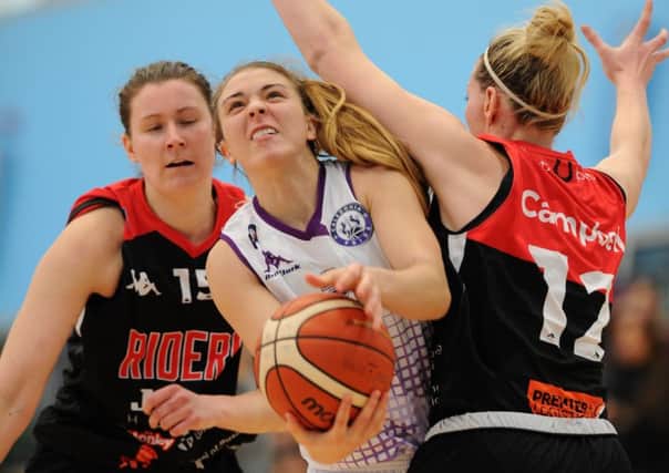 Caledonia Pride's Natalie Bastian squeezes through a tight Leicester Riders defence. Picture: Kevin Murray
