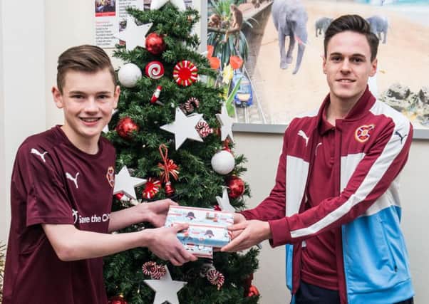 Hearts fan Chris Dickson, 16, from Bonnyrigg met Liam Smith when the Jambos squad visited the Royal Hospital for Sick Children. Pic: Ian Georgeson