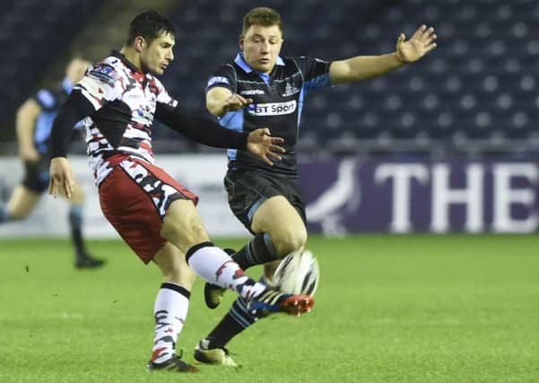 Duncan Weir right, in action for Glasgow against Edinburgh in January. Duncan Hodge, below, insists the stand-off doesnt have a point to prove against his former team-mates today