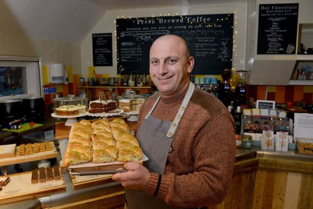 Nour Taleb, a refugee from near Aleppo, with some of his Syrian pastries which are going down a storm in Haddington. Picture: Julie Bull