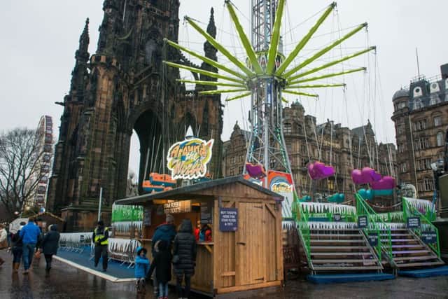 Edinburgh's Christmas is back on despite the bad weather. Picture: Ian Georgeson