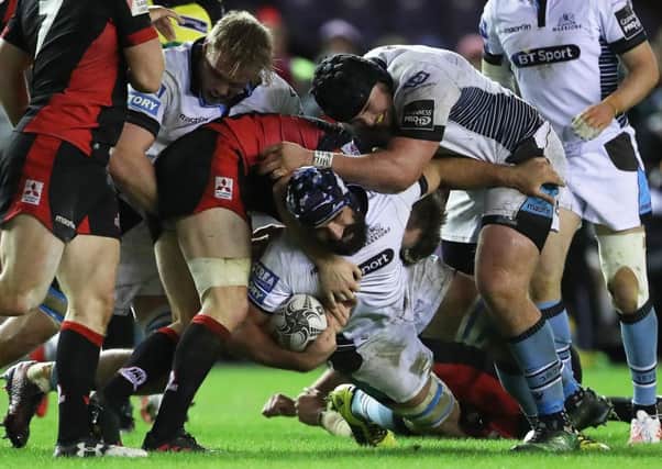 Josh Strauss of Glasgow is tackled by Cornell du Preez. Picture: Ian MacNicol/Getty Images
