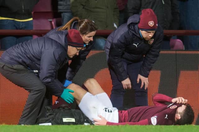 Callum Paterson's injury cast a cloud over Hearts' win. Pic: Ian Georgeson