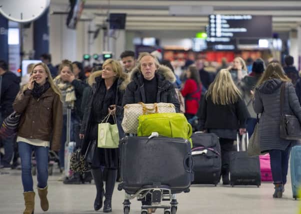 1,000 passengers an hour are expected to touch down on Friday. Picture: Ian Rutherford
