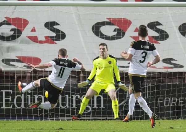 Jonny Hayes strikes home the only goal for Aberdeen