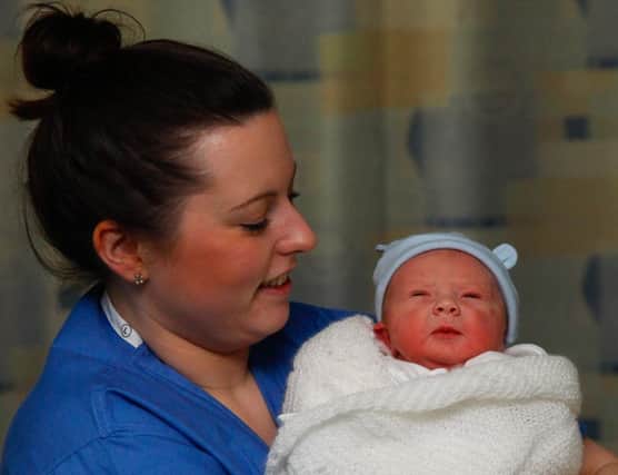 Midwife Amanda Paton with baby Alvie